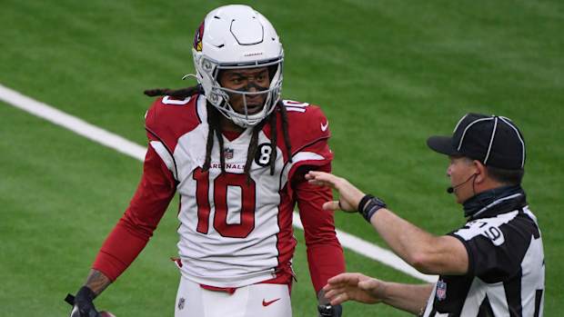 Arizona Cardinals wide receiver DeAndre Hopkins (10) argues with referee Michael Banks (19) after being called for offensive pass interference during the third quarter against the Los Angeles Rams at SoFi Stadium.